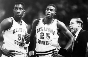 Tony Martin and Harvey Grant get instruction from Coach Tubbs