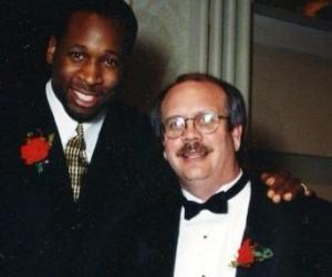 Honoring Wayman with a lifetime achievement award at the Oklahoma Sports Headliner event